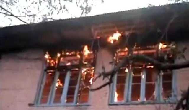 burning kashmir school