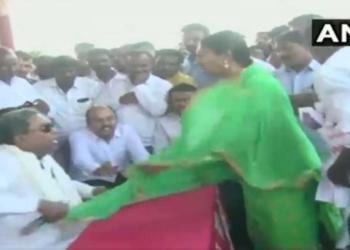 Siddaramaiah misbehaves with a woman in public