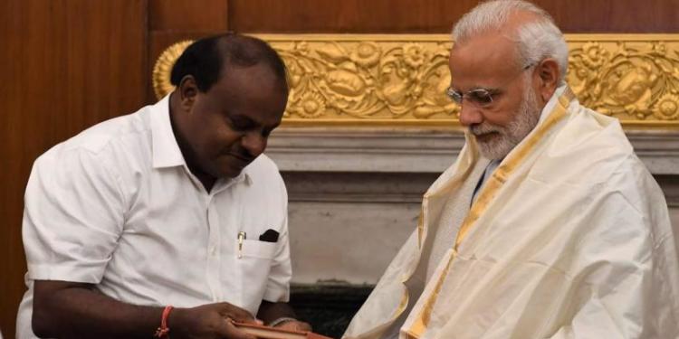 Congress government in Karnataka is set to be flattened by Modi storm