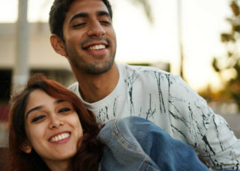 Mishaal Kirpalani holding Ira Khan's hand