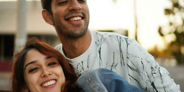 Mishaal Kirpalani holding Ira Khan's hand