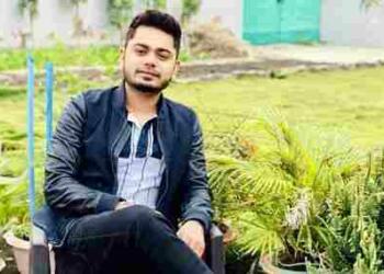 Anish Singh Thakur sitting in lawn
