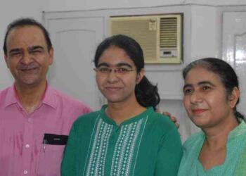 IAS Saumya Pandey with her parents