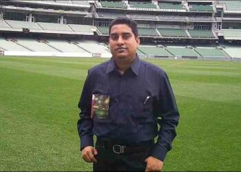 Boria Majumdar in a cricket stadium