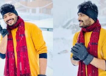 Ravi Krishna playing with snow at kashmir