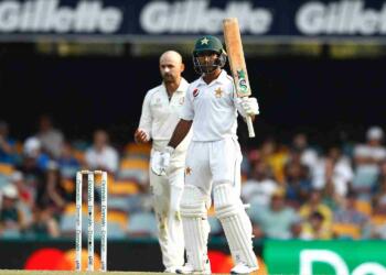 Asad Shafiq celebrating his 100