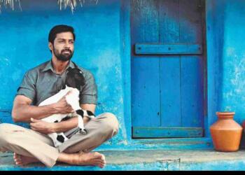 Santhosh Prathap in a movie scene with goat