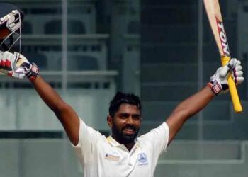 Abhinav Mukund celebrating his hundred