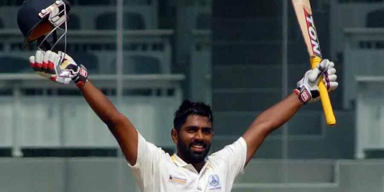 Abhinav Mukund celebrating his hundred