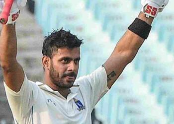 Manoj Tiwary celebrating his 100