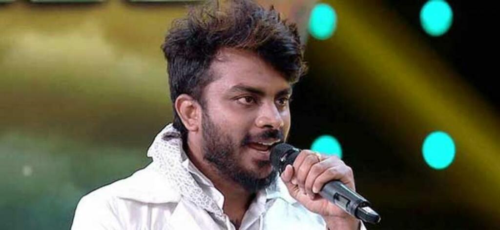 Singer Chandan Shetty singing song at set of big boss