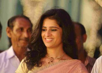 Satya Krishnan in pink saree