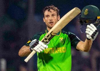 Janneman Malan celebrating his hundred