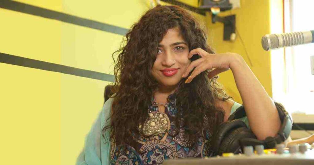 RJ Malishka hosting a radio show