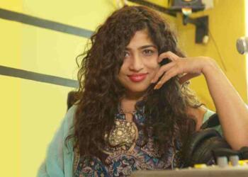 RJ Malishka hosting a radio show
