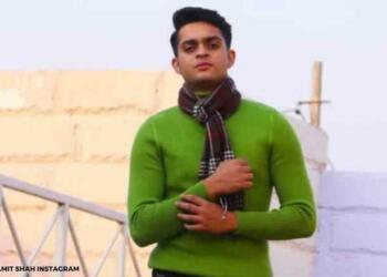namit shah in green sweater