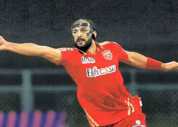 Rishi Dhawan bowling