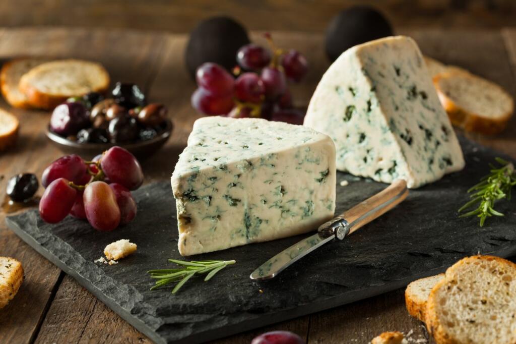 Roquefort cheese is ripened by