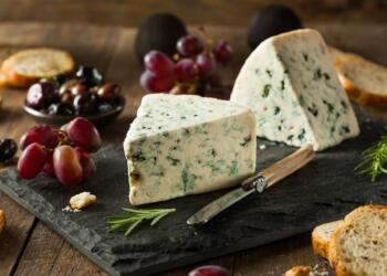 Roquefort cheese is ripened by
