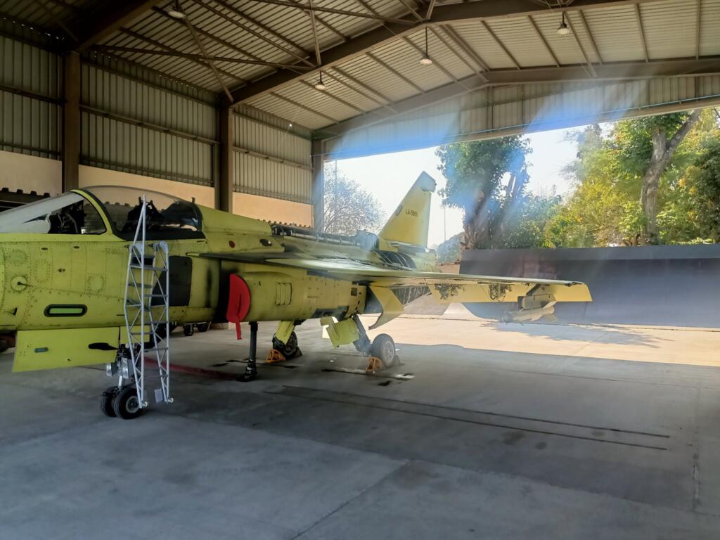 Tejas Mk1A light combat aircraft with tail number LA5051 inside a HAL hangar during final assembly.