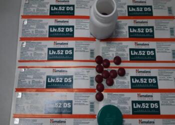 Himalaya Liv.52 DS tablets with original blister packs, bottle, and tablets for liver health support.